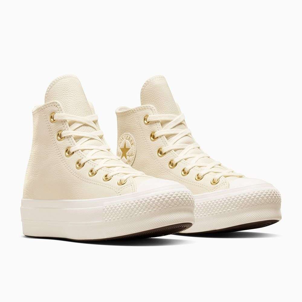 Shop Converse Women Chuck Taylor All Star Lift Platform Gold Beige